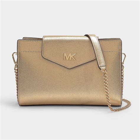 michael kors pale gold tote|Michael Kors gold crossbody bag.